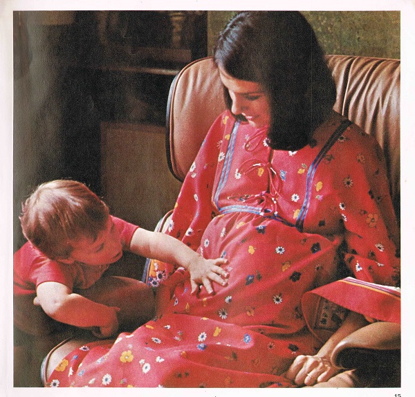 boy feels baby kicking