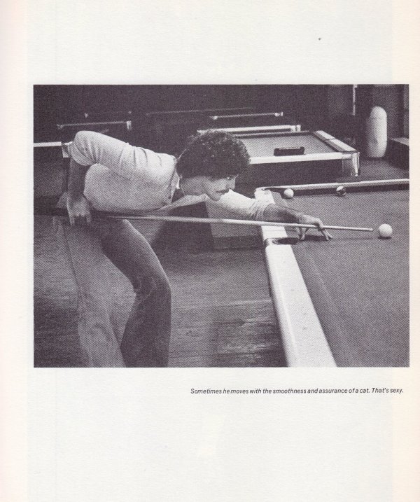 man playing pool