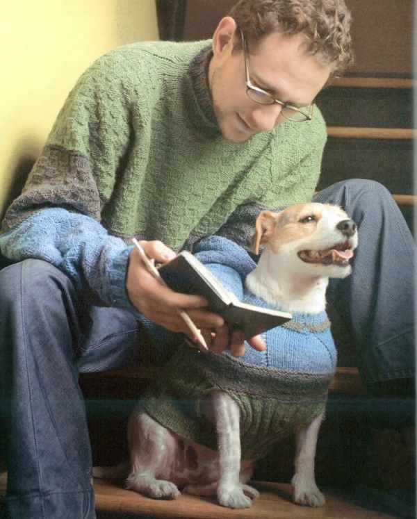 man reading with dog